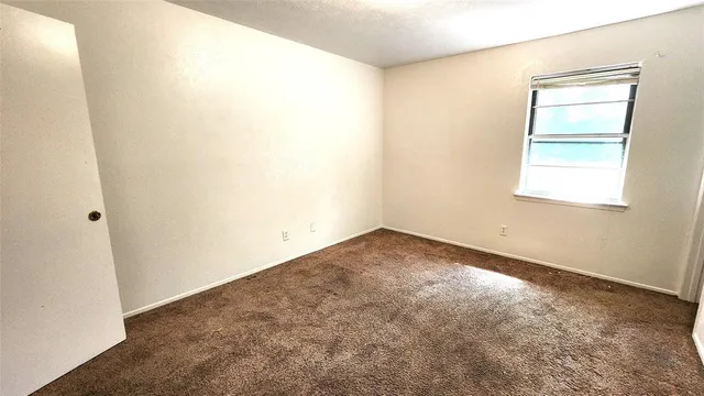a view of livingroom with hallway