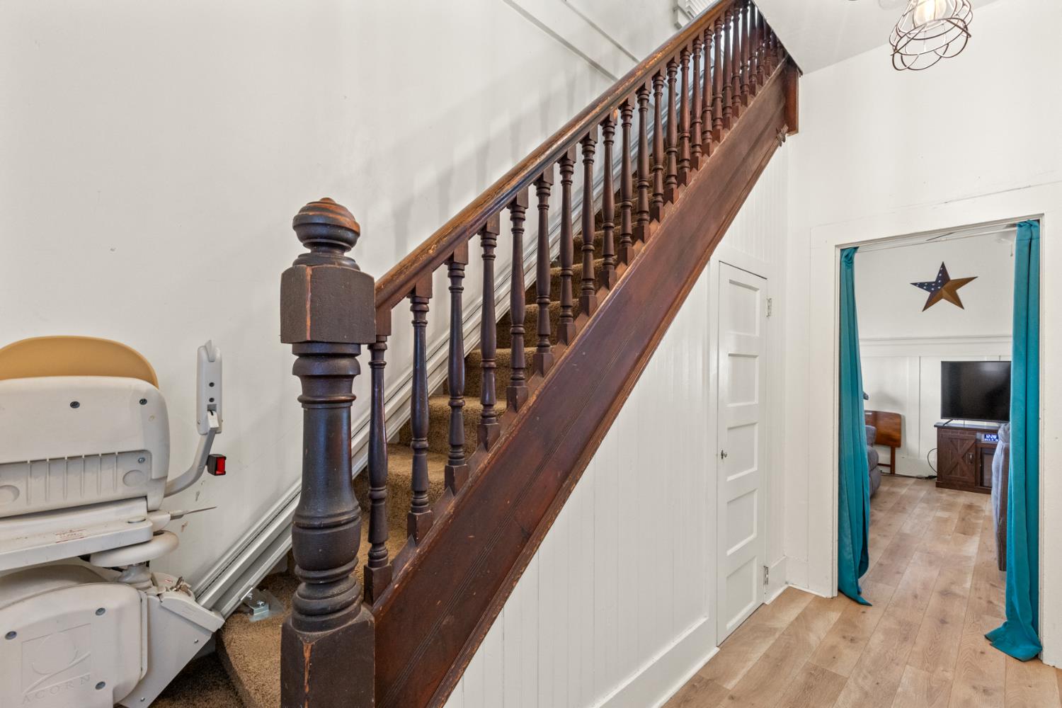 490 Hazel Street Gridley, CA 95948 - Photo 15 of 28 a view of hallway with wooden floor and stairs