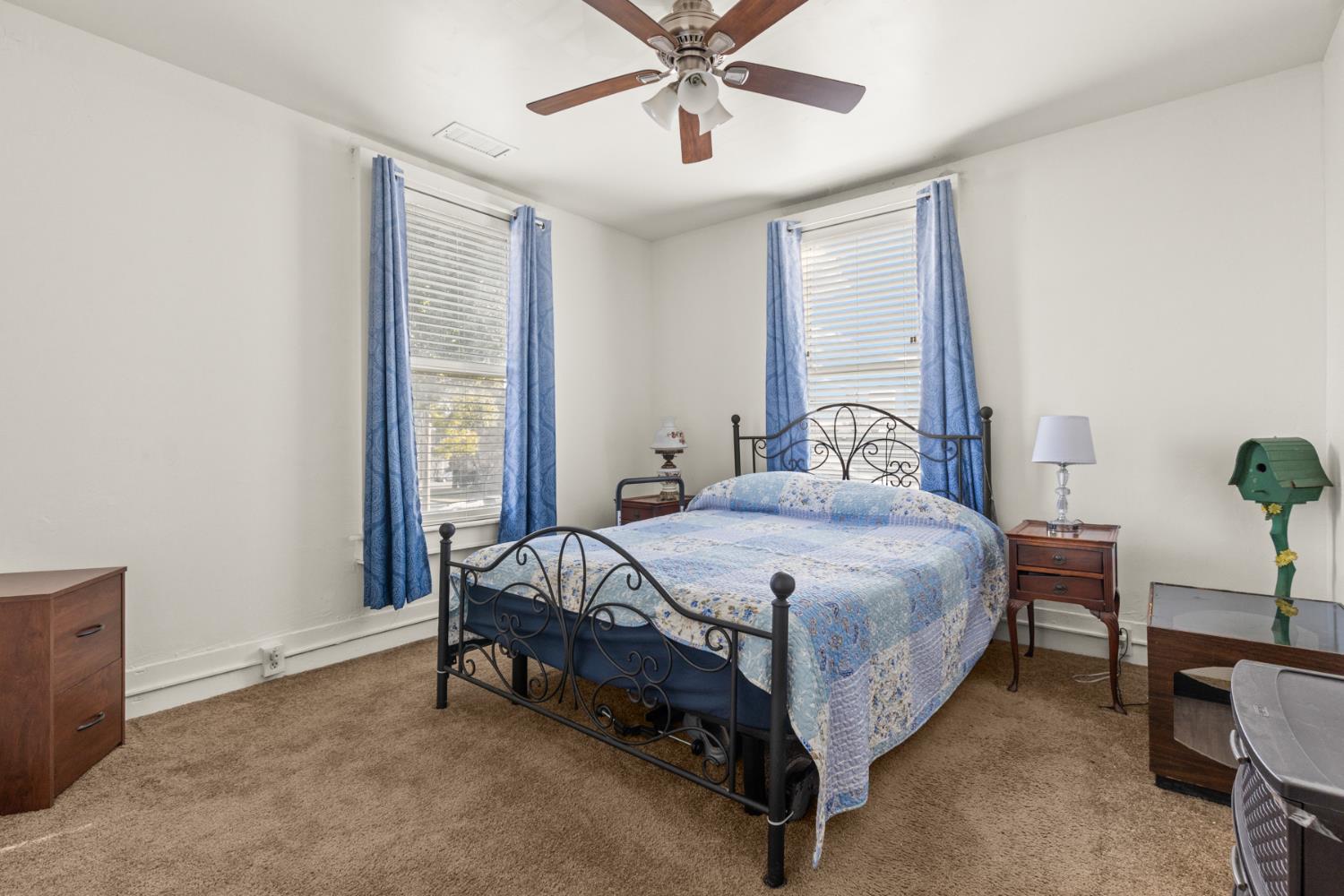 490 Hazel Street Gridley, CA 95948 - Photo 17 of 28 a bedroom with a bed and a window