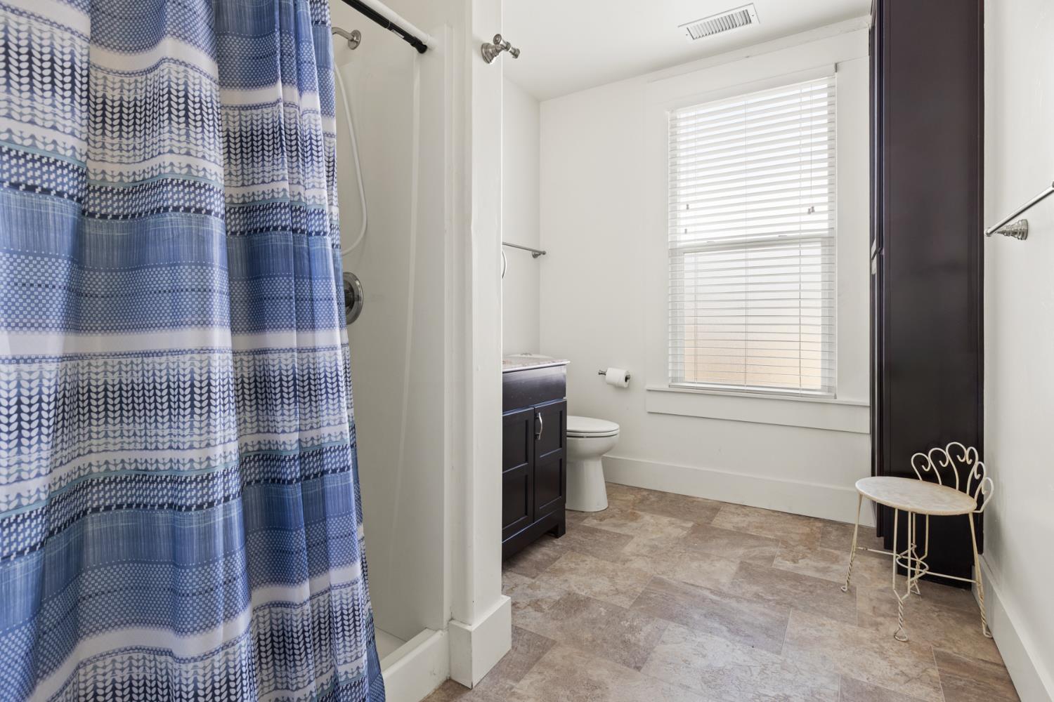 490 Hazel Street Gridley, CA 95948 - Photo 18 of 28 a bathroom with a sink and a shower