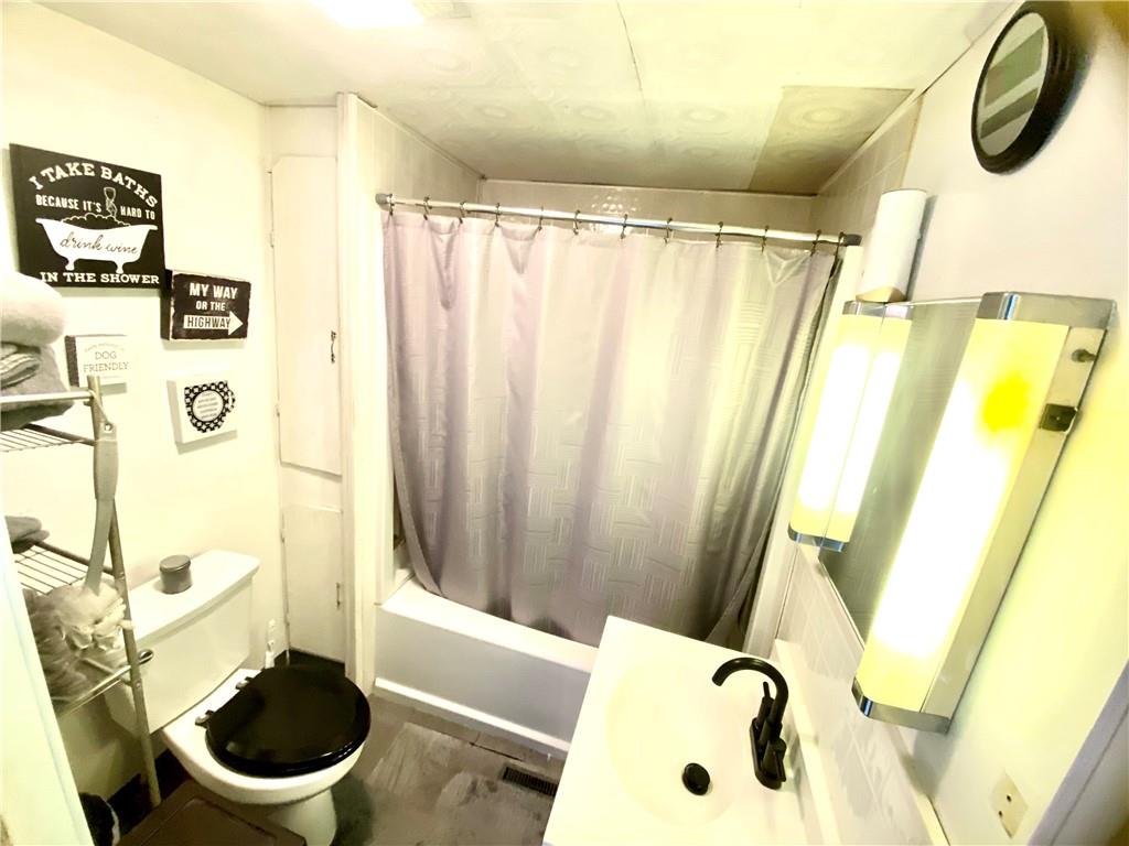 3967 Stiffler Hill Road Cherry Tree, PA 15724 - Photo 5 of 18 a bathroom with a sink toilet and shower