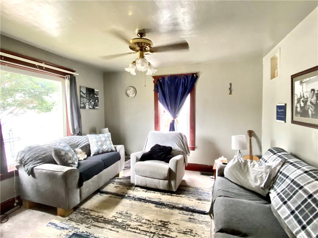 3967 Stiffler Hill Road Cherry Tree, PA 15724 - Photo 6 of 18 a living room with furniture and a window