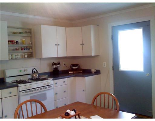 98 Merrills Mills Road Dover-Foxcroft, ME 04426 - Photo 3 of 11 Kitchen.