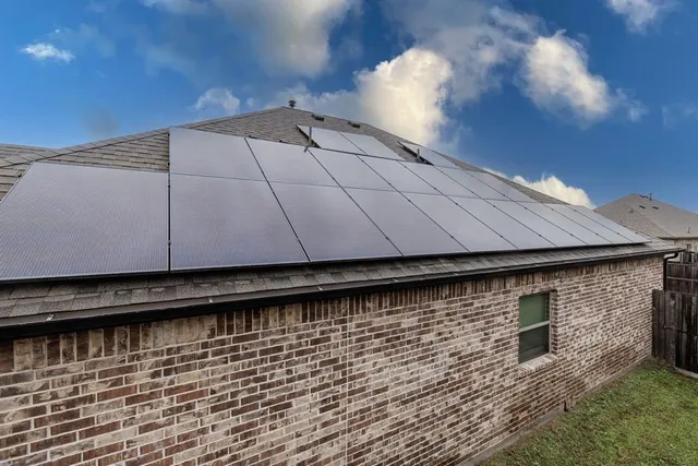 a view of a backyard of the house