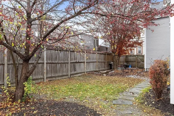 a view of backyard with green space