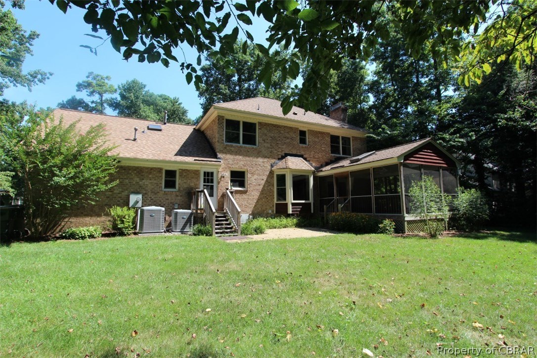 308 Tides Run Yorktown, VA 23692 - Photo 26 of 34 a view of a house with a yard patio and a large tree
