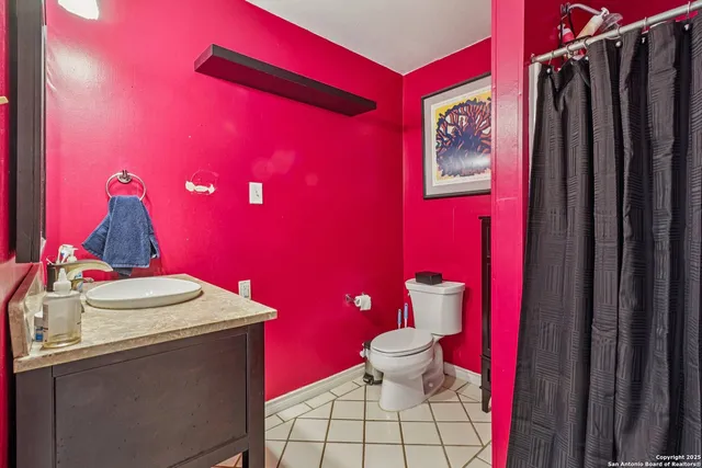 a bathroom with a sink and a toilet
