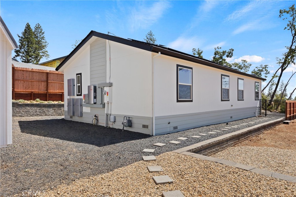 1575 La Grand View Road Paradise, CA 95969 - Photo 27 of 38 a view of a house with a yard