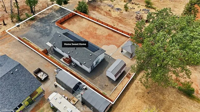 an aerial view of a house with a garden