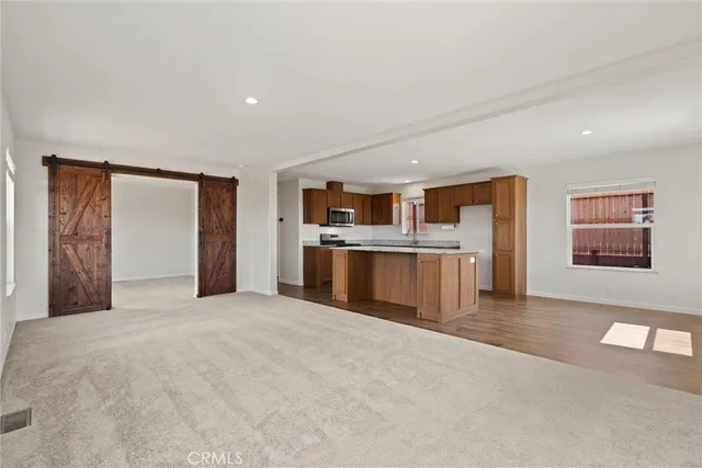 a view of a kitchen with a sink