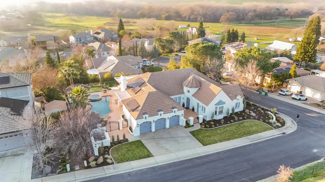 a view of a city with lawn chairs