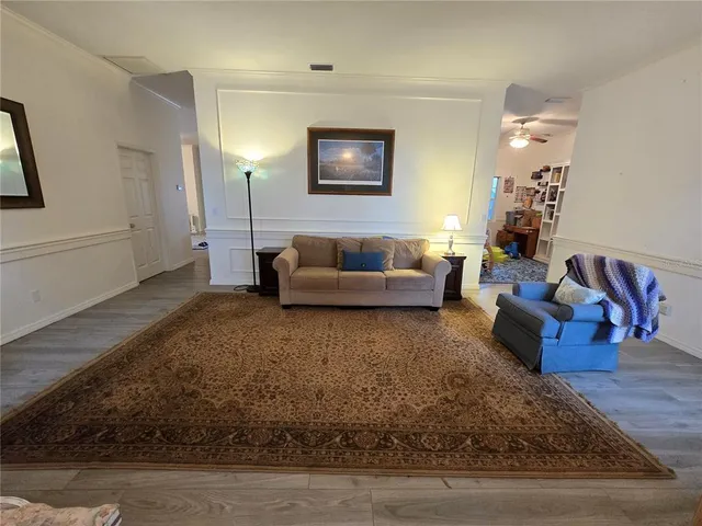 a living room with furniture and a couch