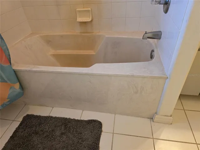 a bathroom with a bathtub