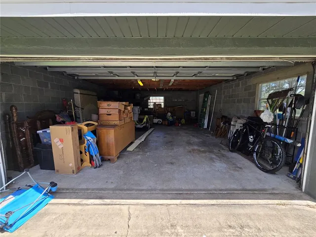 a view of water heater room with gym equipment