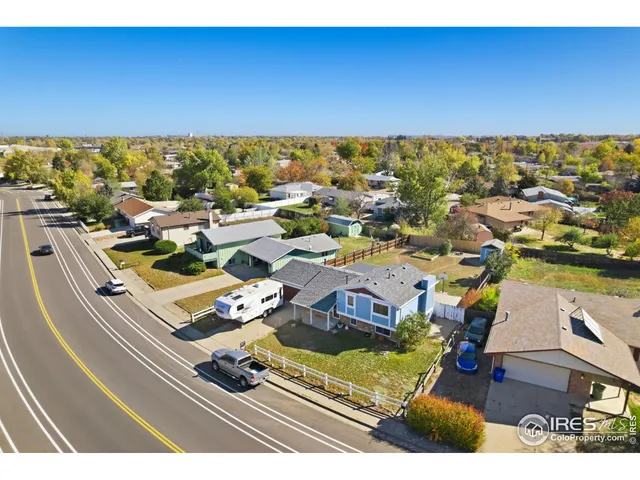 a view of an outdoor space with lounge chair