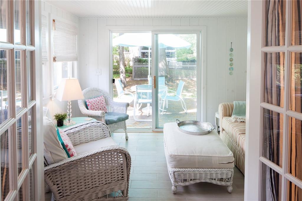 29 Cable Street Wells, ME 04090 - Photo 25 of 34 The sunroom has a slider to the deck...