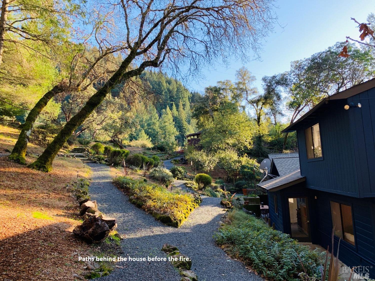 7905 St Helena Road Santa Rosa, CA 95404 - Photo 21 of 28 a backyard of a house with lots of green space