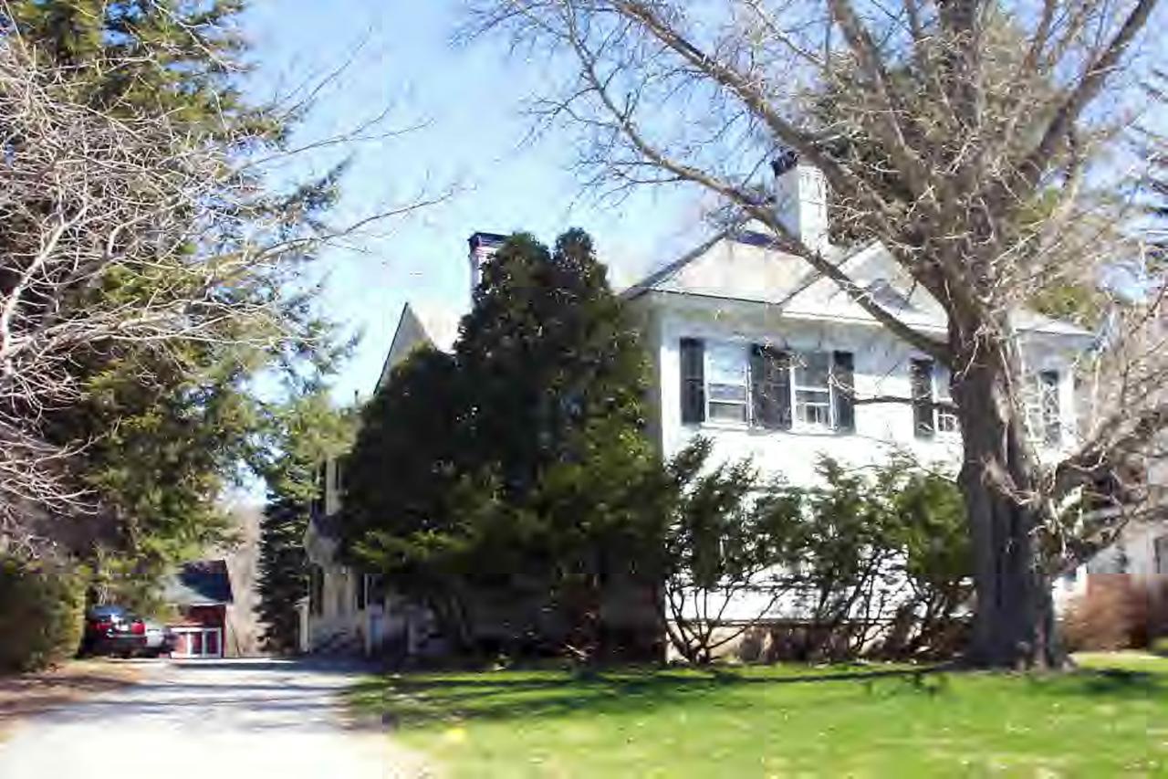 41-7 Main Street Stockbridge, MA 01262 - Photo 1 of 1 front view of a house with a yard