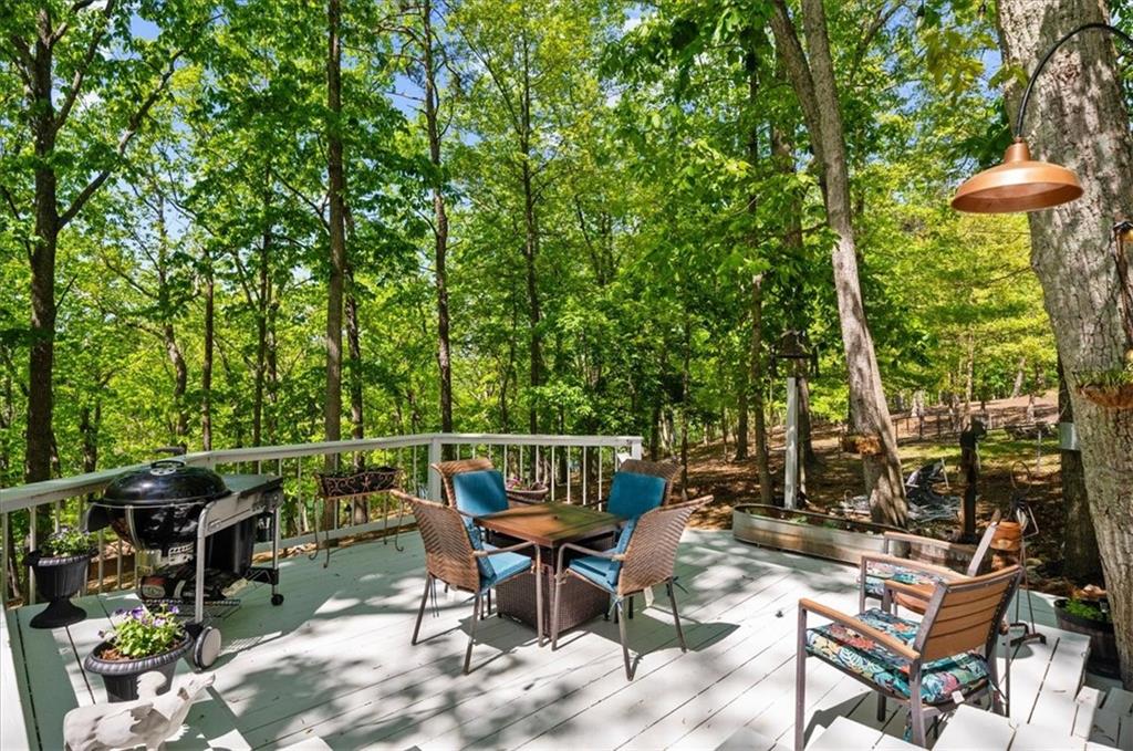 6551 Bermuda Lane Flowery Branch, GA 30542 - Photo 25 of 43 a view of chair and tables
