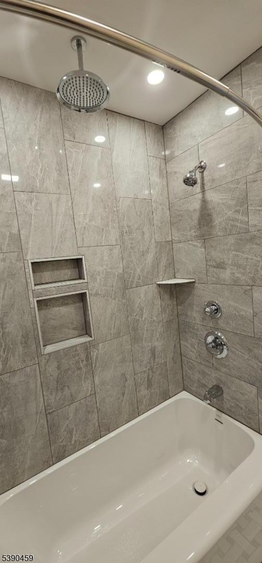 1240 Van Houten Avenue, Unit 7A Clifton, NJ 07013 - Photo 13 of 14 a bathroom with a bathtub