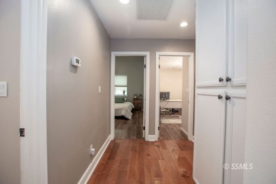 421 Christopher Court Ridgecrest, CA 93555 - Photo 23 of 50 a view of a hallway with a hardwood floor