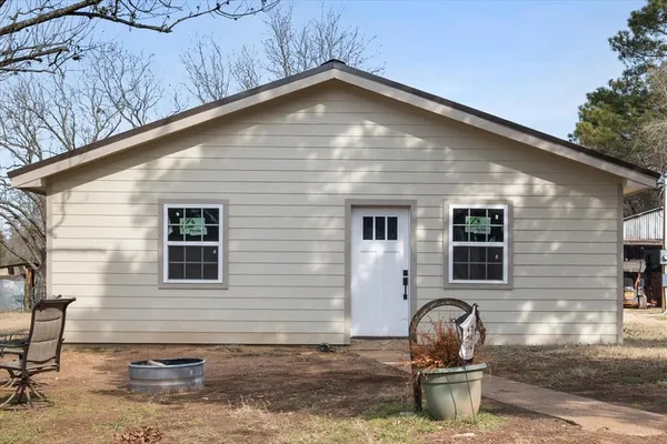 a front view of a house with patio