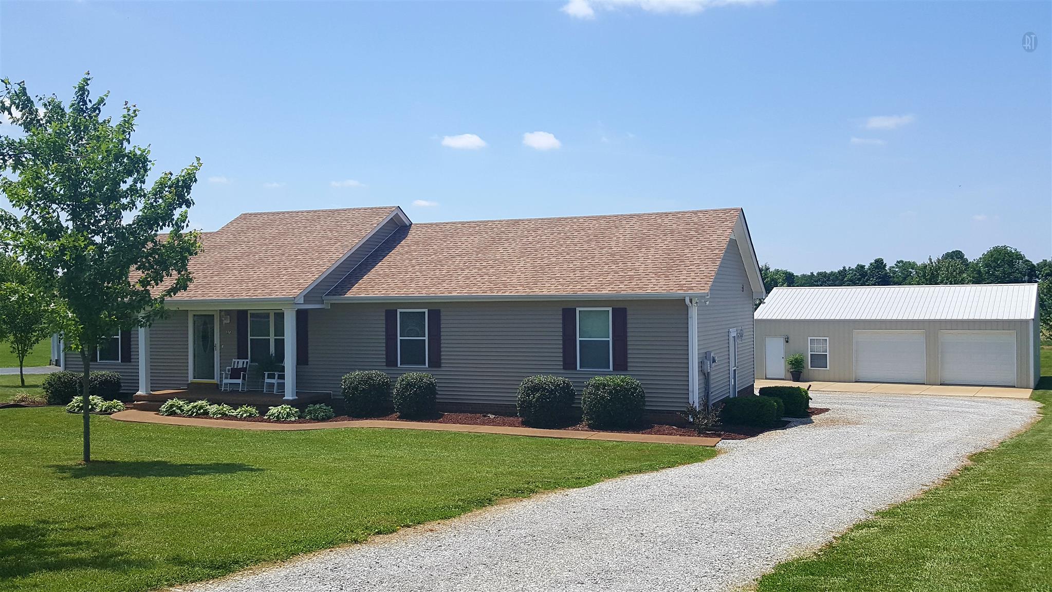 272 Collins Road Portland, TN 37148 - Photo 2 of 17 a front view of house with yard and green space