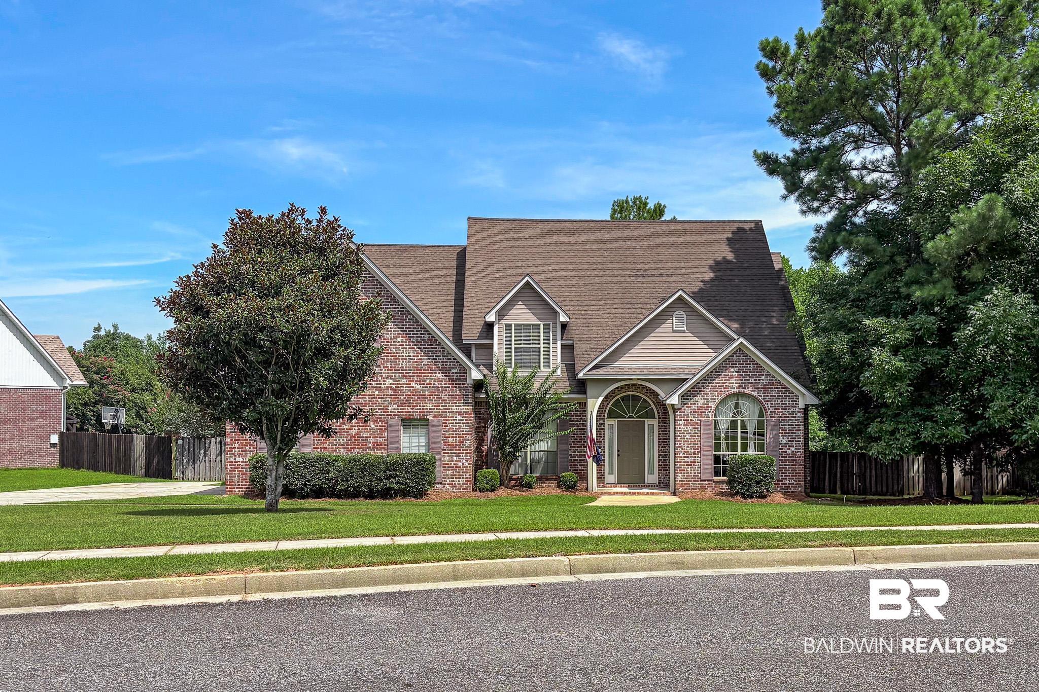 8421 Weatherford Court Daphne, AL 36527 - Photo 3 of 36 View of front of home with brick siding and roof with shingles