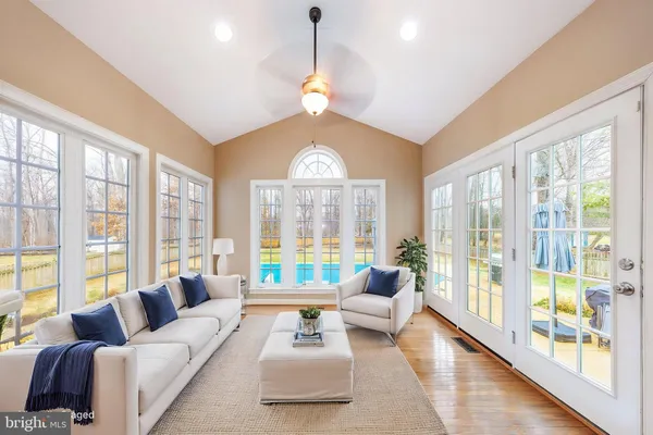 a kitchen with a sink a counter top space and stainless steel appliances