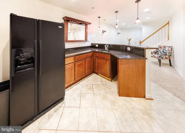 a garden with trees in front of it