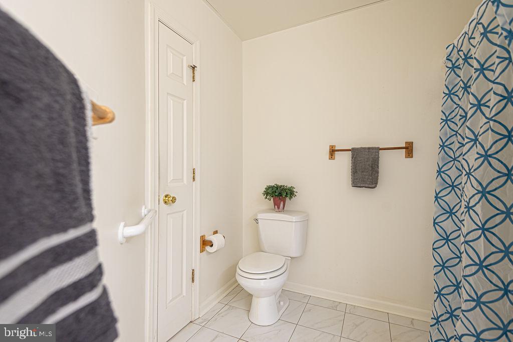 14 Liberty Street Ocean Pines, MD 21811 - Photo 37 of 69 a bathroom with a toilet and a shower