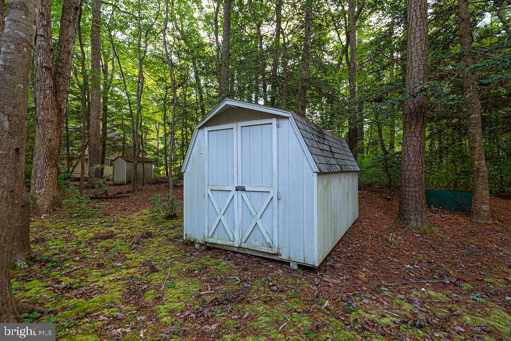 14 Liberty Street Ocean Pines, MD 21811 - Photo 57 of 69 a view of backyard with green space and wooden fence