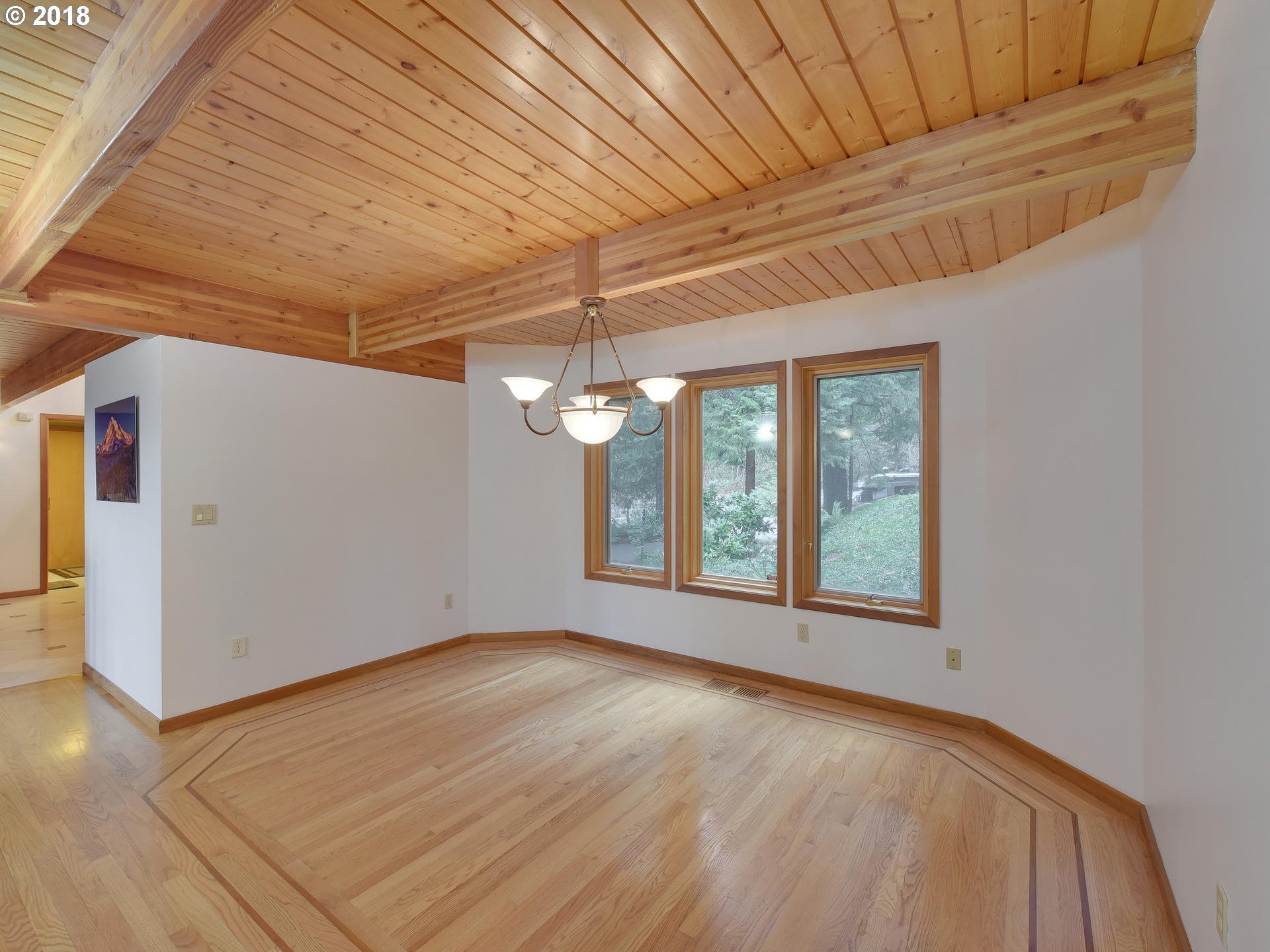 22200 East Lolo Pass Road Rhododendron, OR 97049 - Photo 12 of 32 a view of an empty room with a window