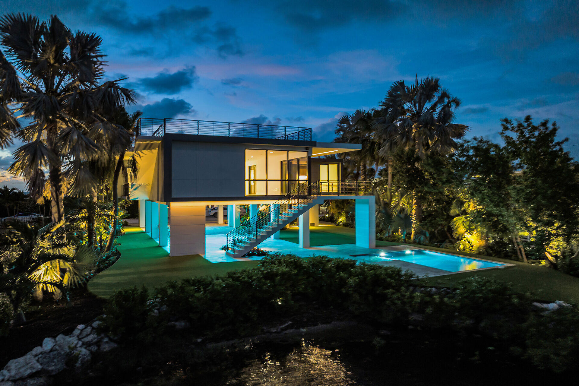62 Mutiny Place Key Largo, FL 33037 - Photo 17 of 70 a view of a back yard of the house and green space