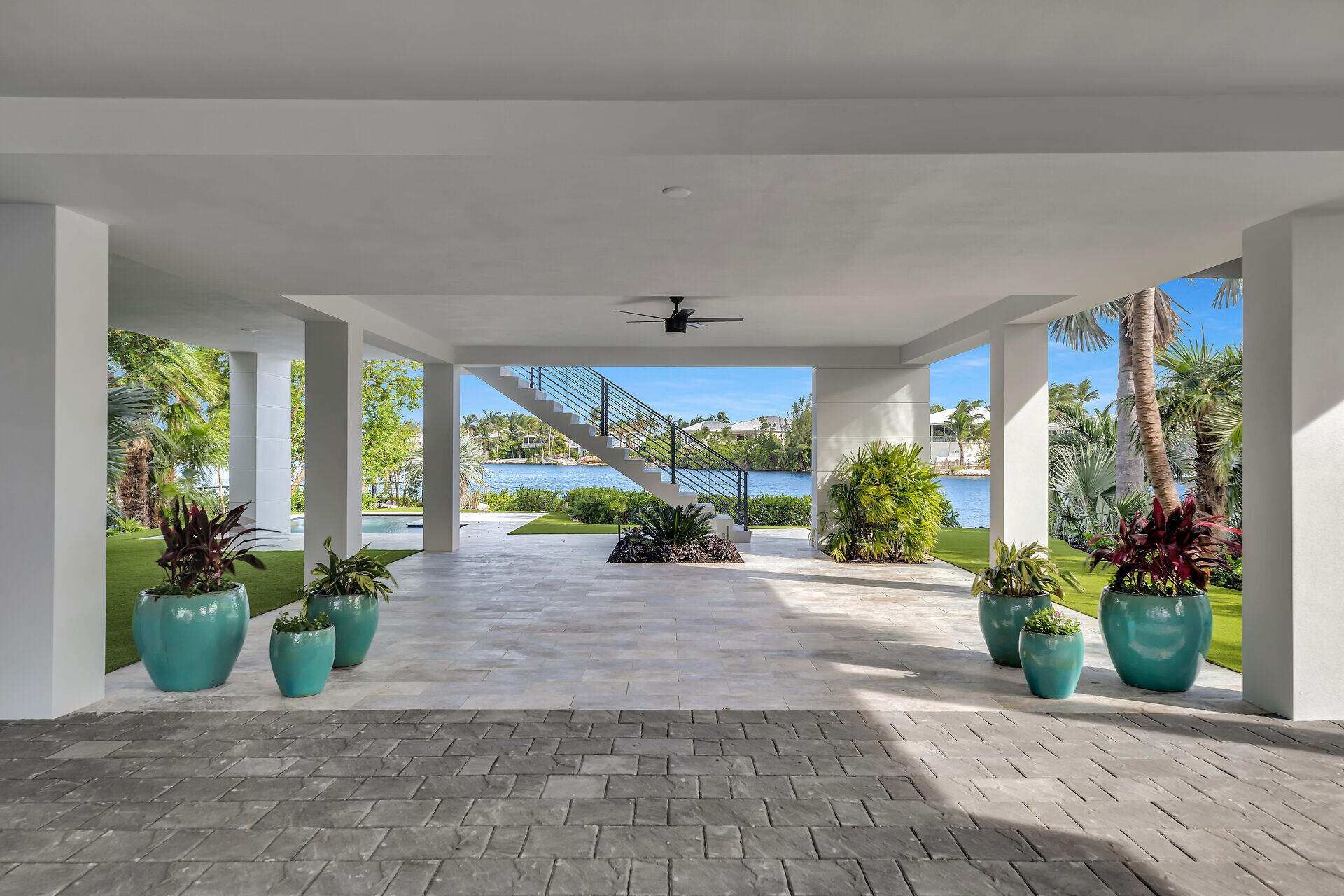 62 Mutiny Place Key Largo, FL 33037 - Photo 18 of 70 a view of a garden with plants and a potted plant