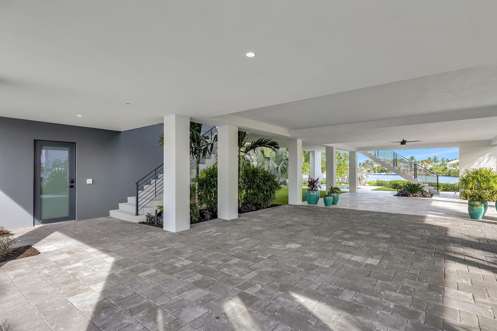 62 Mutiny Place Key Largo, FL 33037 - Photo 19 of 70 a view of a house with porch and garden