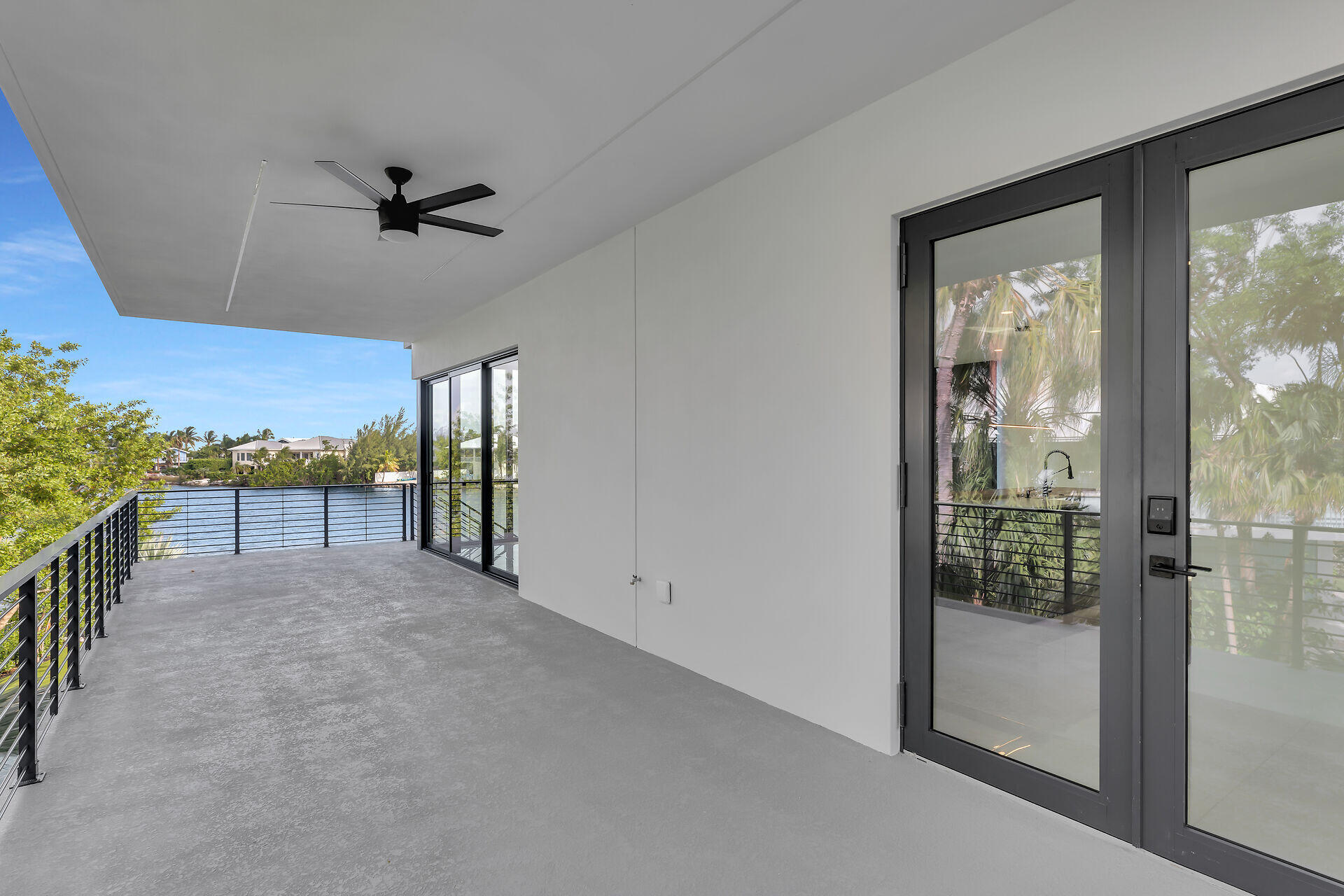 62 Mutiny Place Key Largo, FL 33037 - Photo 20 of 70 a view of a room with a ceiling fan and window