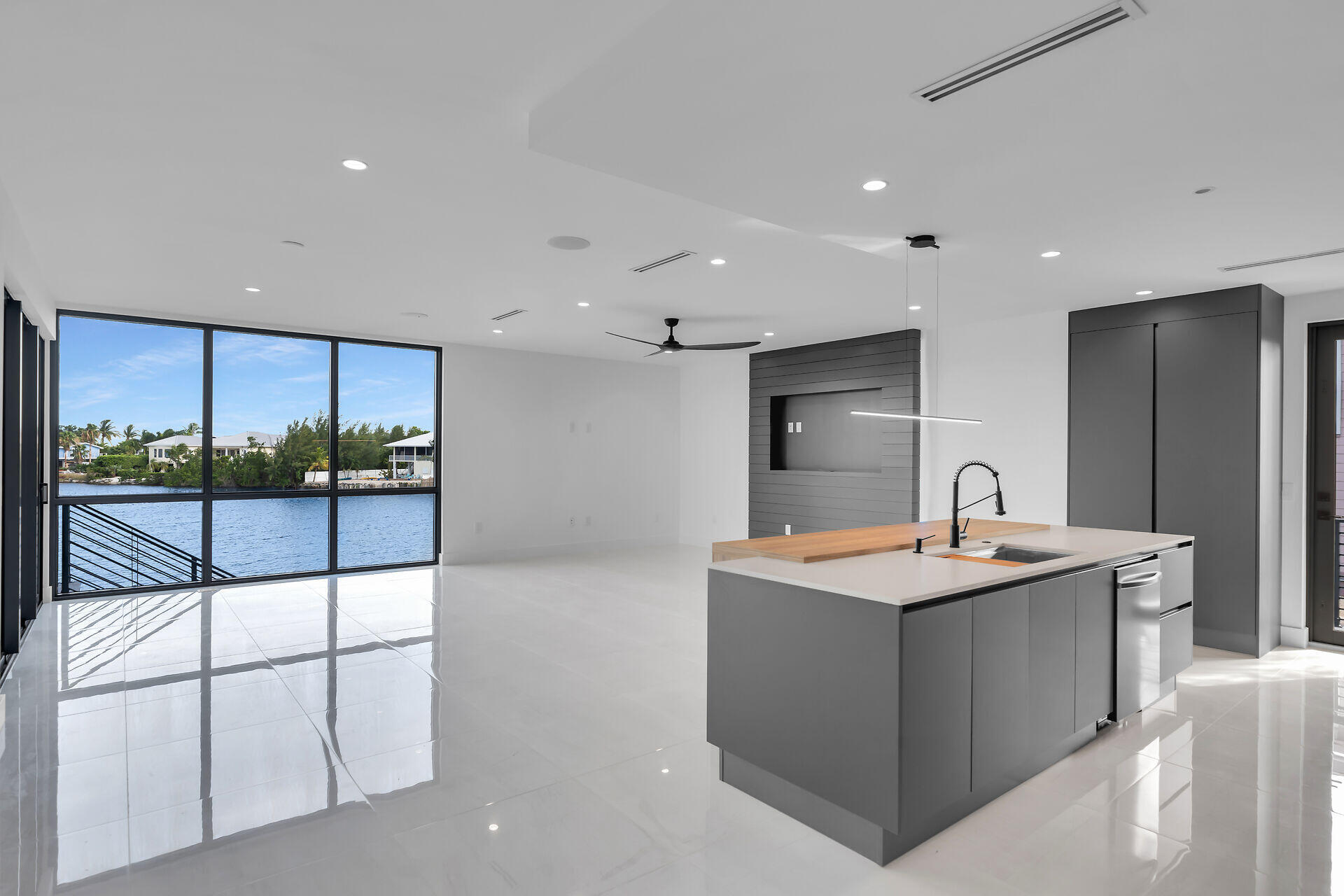 62 Mutiny Place Key Largo, FL 33037 - Photo 21 of 70 a kitchen with a sink a counter top space and stainless steel appliances