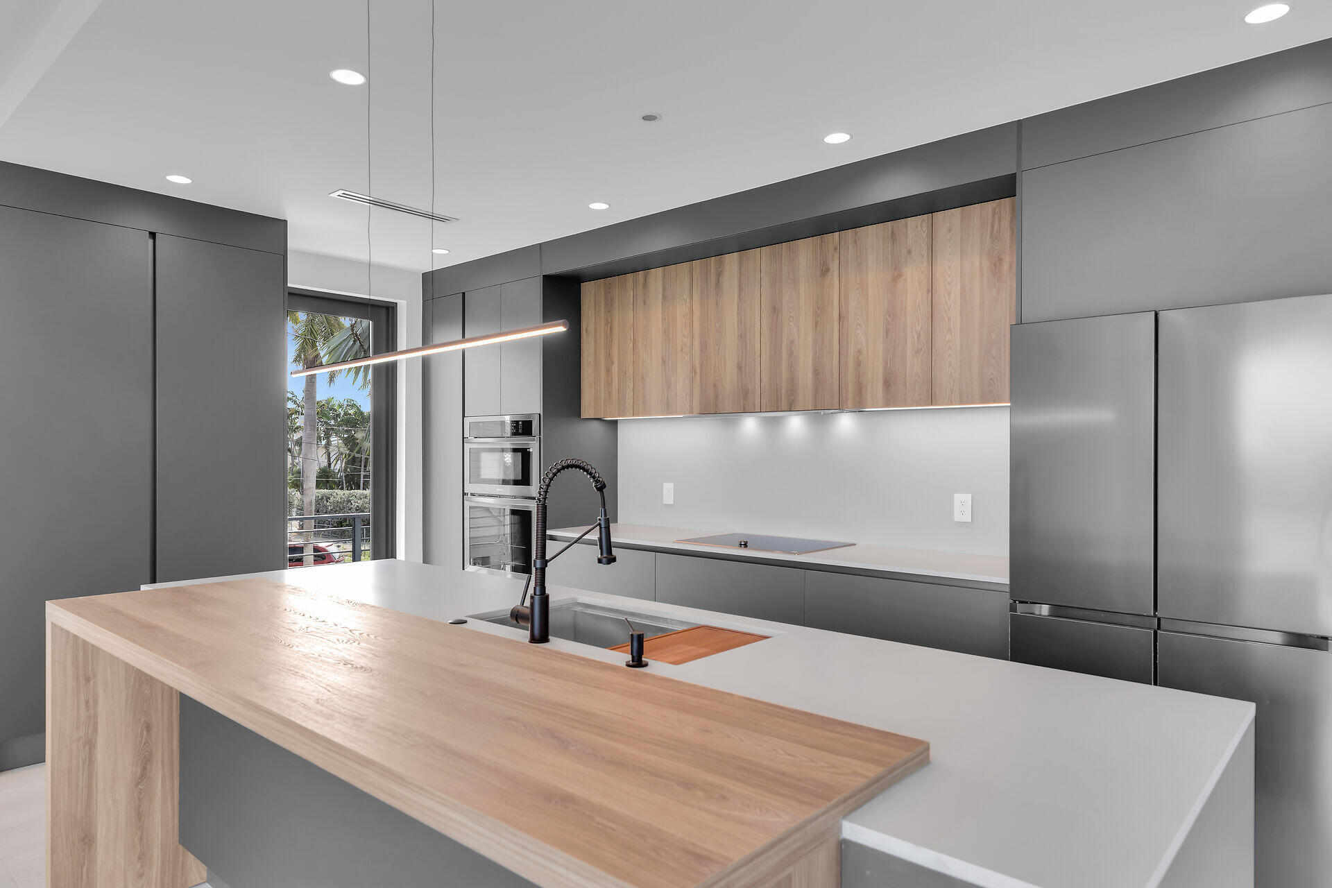 62 Mutiny Place Key Largo, FL 33037 - Photo 26 of 70 a kitchen with kitchen island a counter top space cabinets and stainless steel appliances