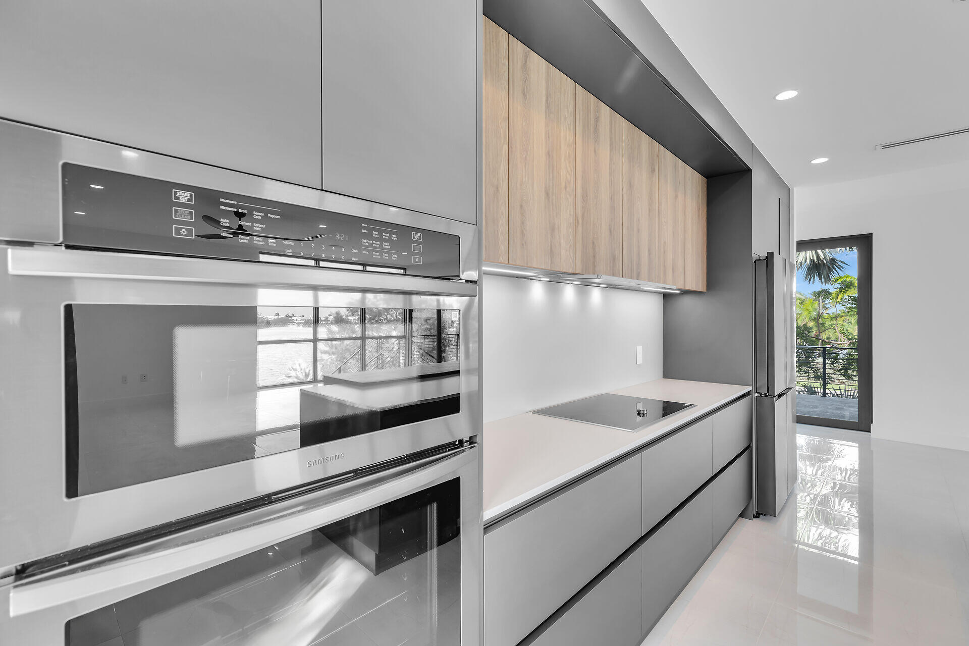 62 Mutiny Place Key Largo, FL 33037 - Photo 29 of 70 a kitchen with stainless steel appliances granite countertop a sink and a stove
