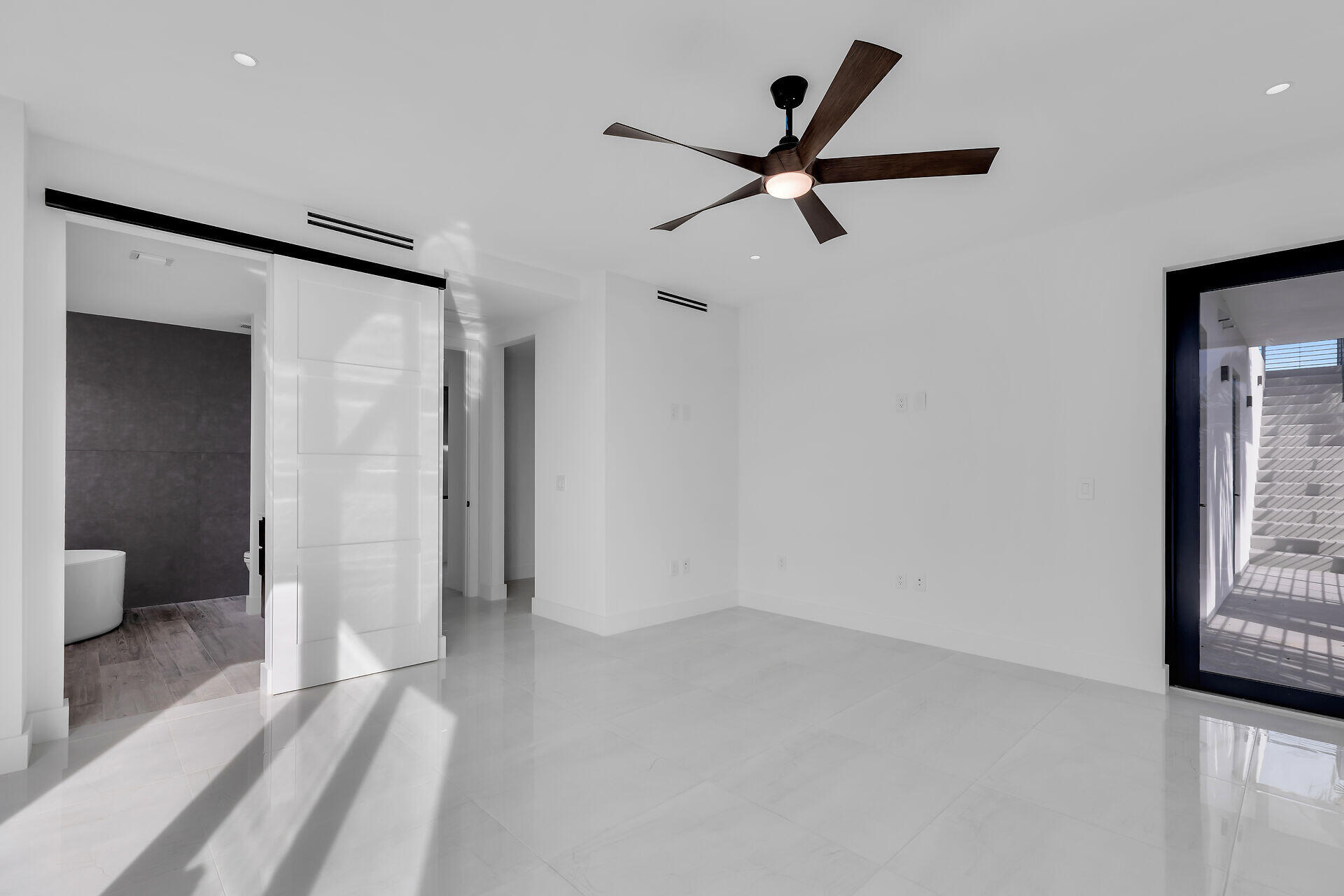 62 Mutiny Place Key Largo, FL 33037 - Photo 36 of 70 a view of a livingroom with a ceiling fan and window