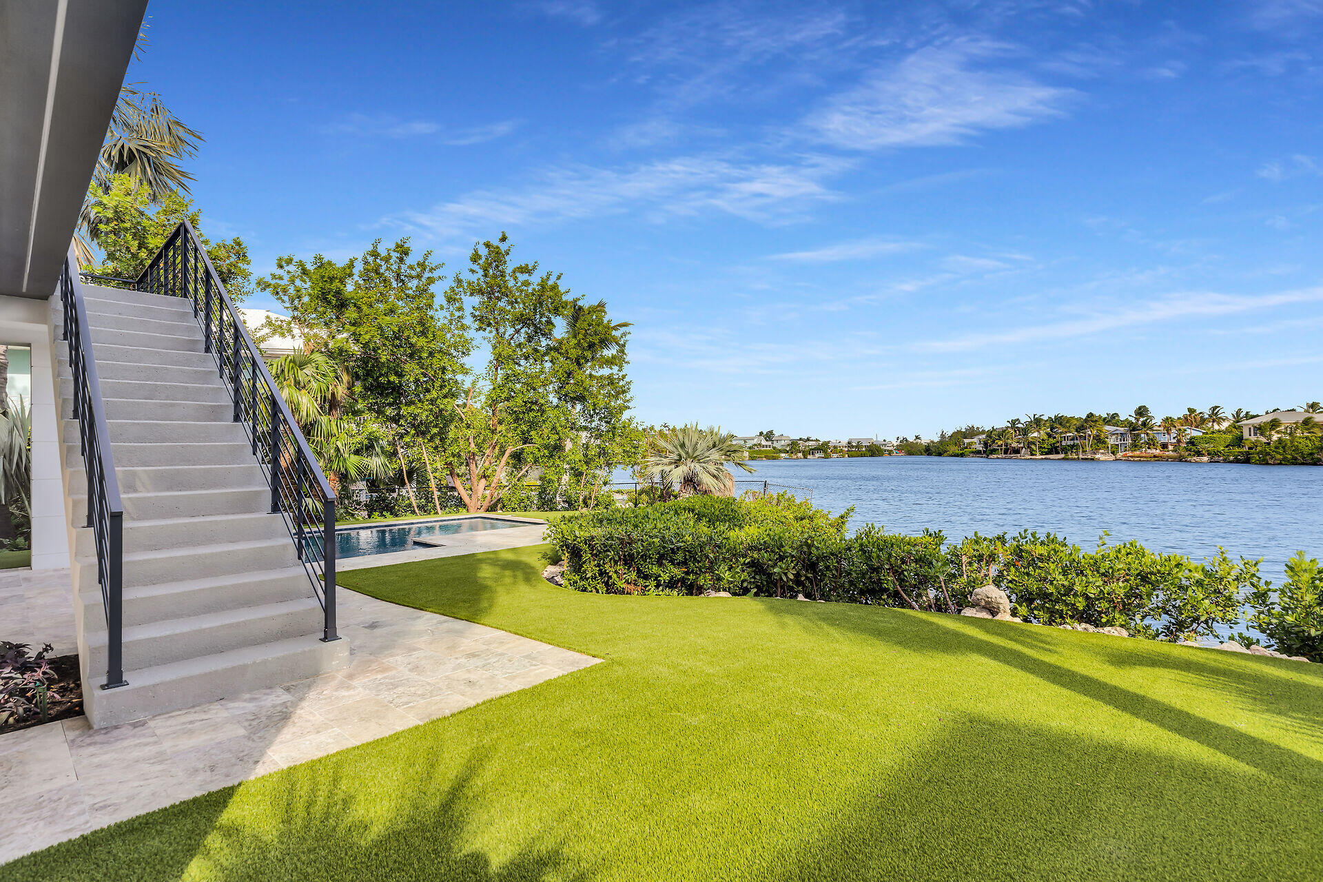 62 Mutiny Place Key Largo, FL 33037 - Photo 55 of 70 a view of a lake with a house in the background