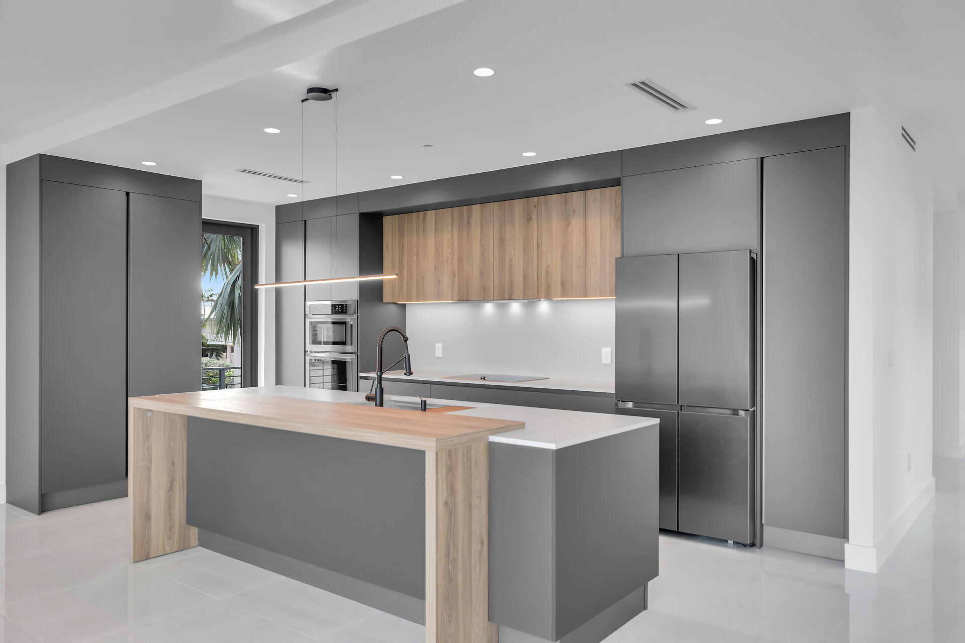 62 Mutiny Place Key Largo, FL 33037 - Photo 9 of 70 a kitchen with stainless steel appliances granite countertop a refrigerator and a stove