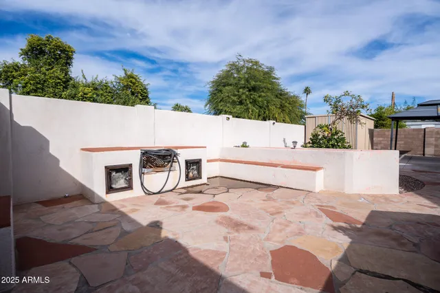 a view of a back yard of the house