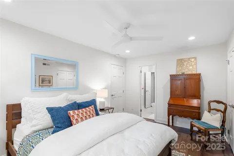 a bedroom with a bed and furniture