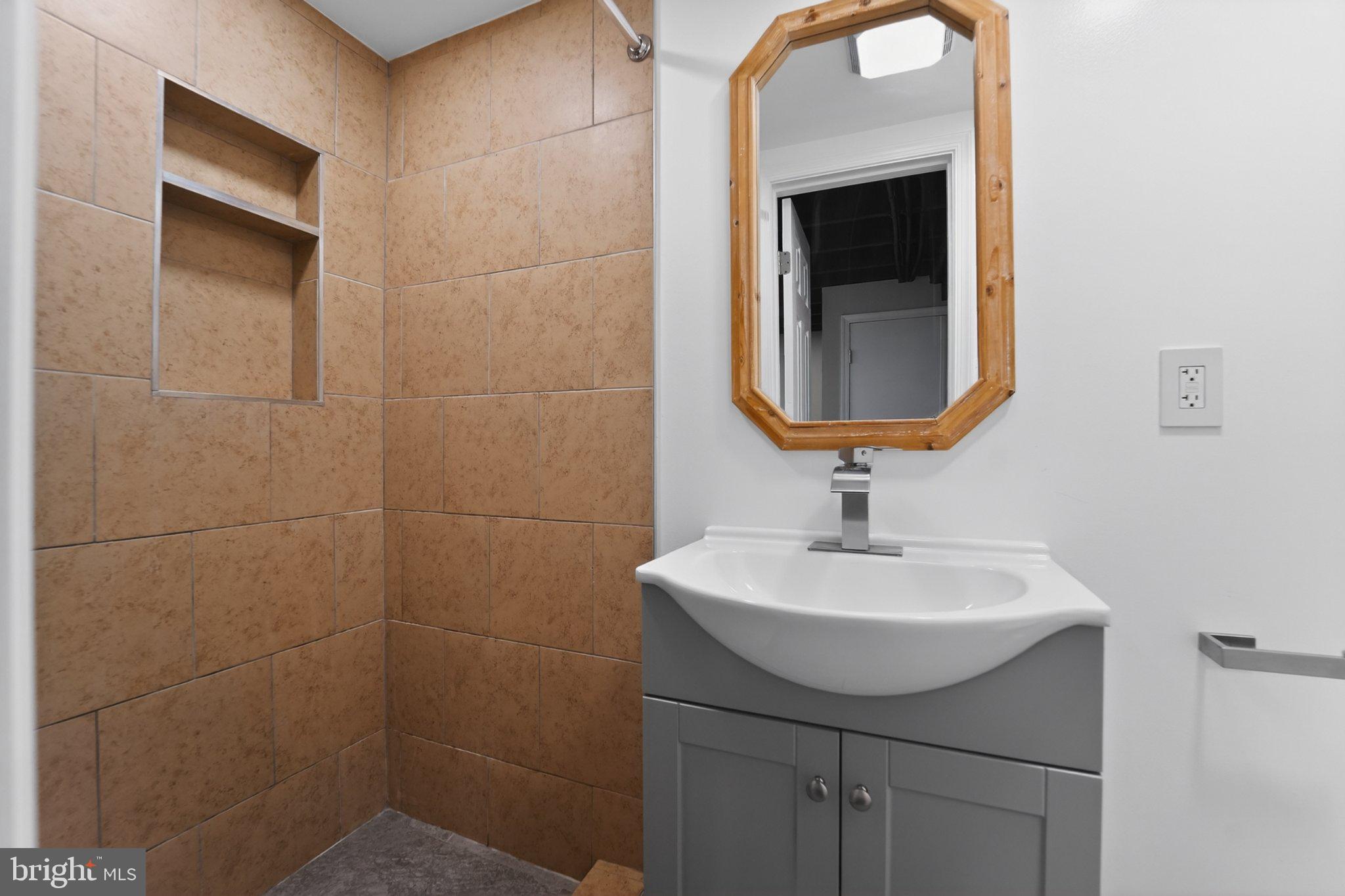 643 South Wickham Road Baltimore, MD 21229 - Photo 16 of 32 Modern bathroom with sleek design.