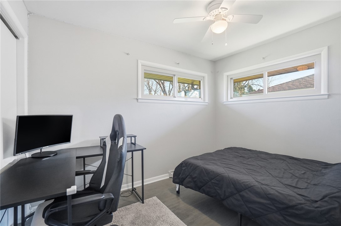 1325 Chelsea Road Troy, OH 45373 - Photo 25 of 42 This serene bedroom offers ample natural light and comfortable flooring, perfect for rest and rejuvenation.