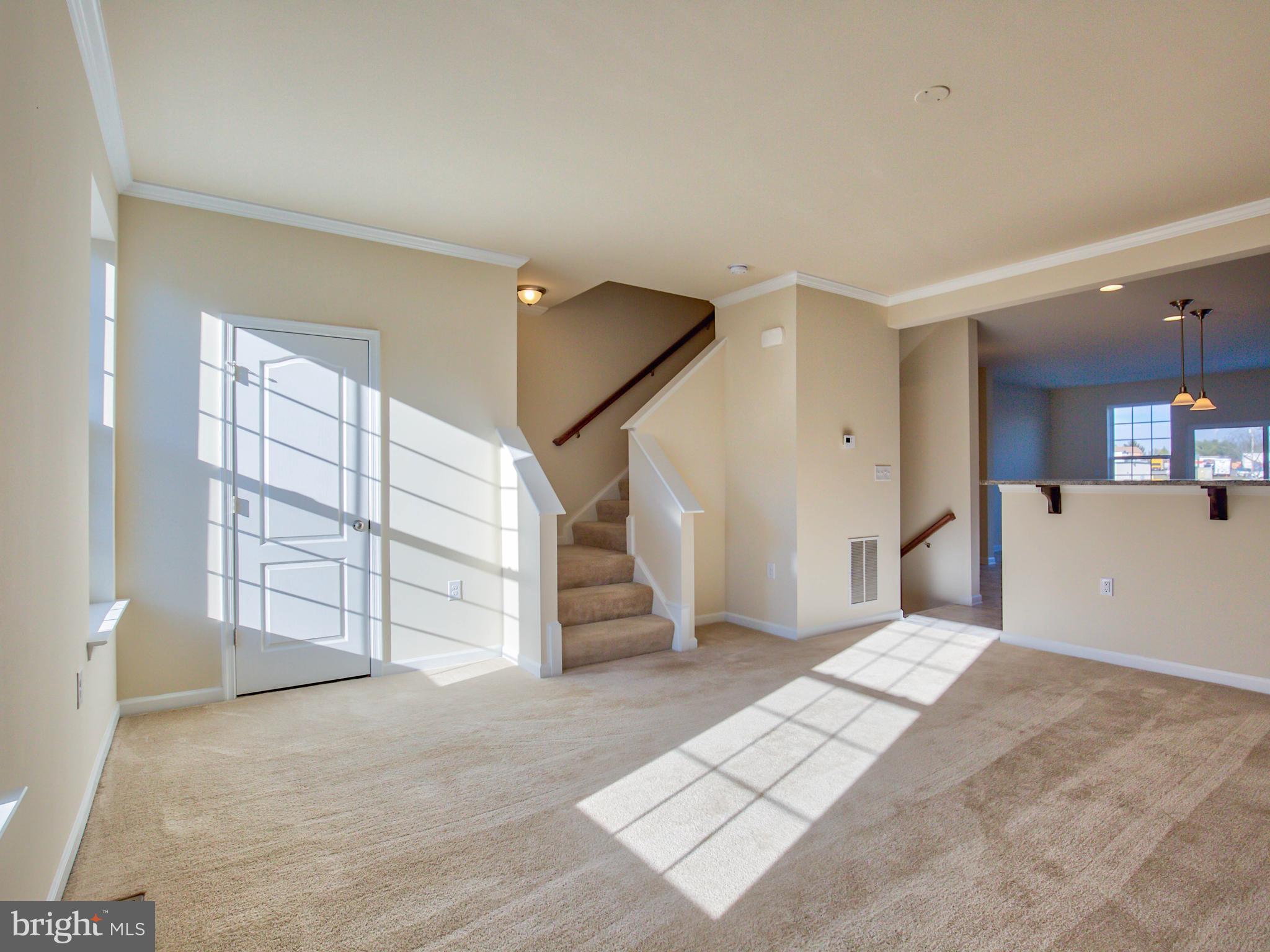 157 Schramm Loop Stephens City, VA 22655 - Photo 37 of 37 Open floor plan from living room to kitchen