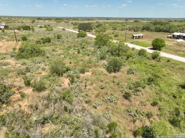 a view of a yard with an outdoor space