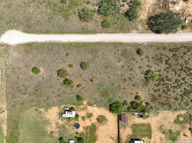 a view of balcony with wooden floor